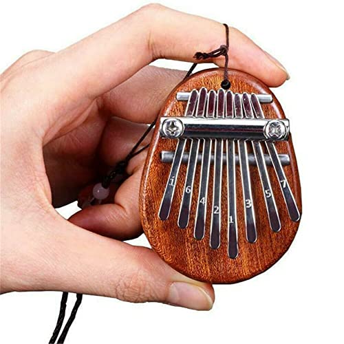 Qianderer Mini piano à pouce 8 touches Kalimba avec cordons, cadeau de Noël pour la famille, marron - Les Beatles, Paul McCartney, John Lennon, RIngo Starr, George Harrison Qianderer Mini piano à pouce 8 touches Kalimba avec cordons, cadeau de Noël pour la famille, marron – Image 4