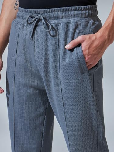 Image of Bewakoof Men's Solid Regular Fit Cotton Blend Track Pants