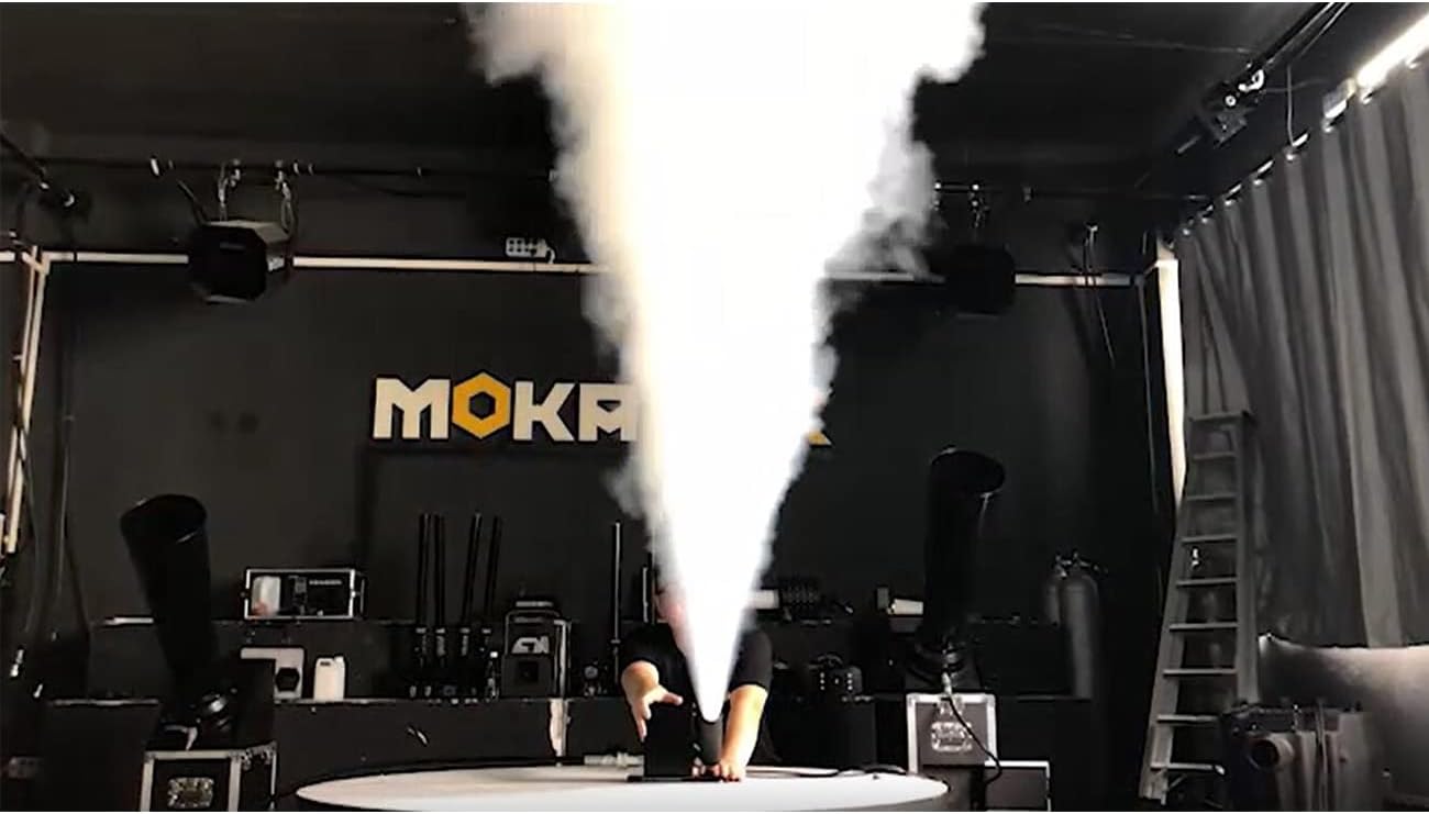 Rear panel of the MOKA SFX CO2 Jet Machine showing DMX IN/OUT ports, power input, and fuse.