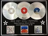 Un affichage triple album magnifique avec 3 Platinum Records de l'artiste / s.