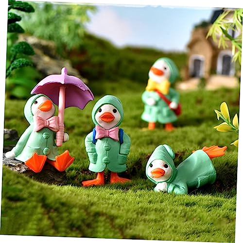 BCOATH 8 Pçs Capa De Chuva Patinho Recipiente De Plástico Mini Brinquedo Topper De Mesa Estátuas De