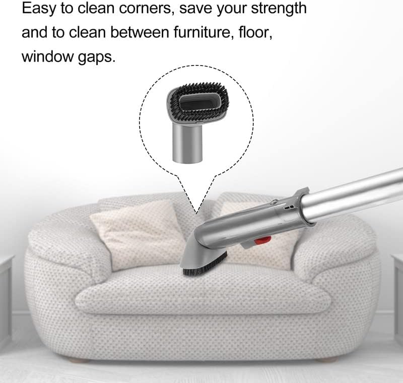 Dust brush being used to clean a sofa