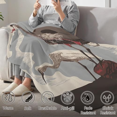 Plaid deux hérons douceur flanelle pour cocon de chaleur