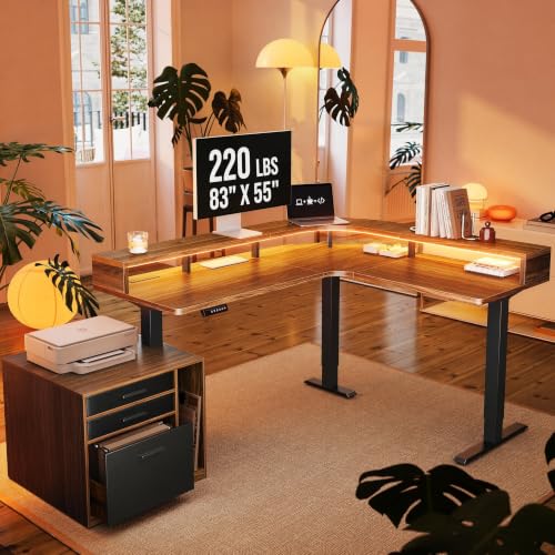 Image of HUANUO LED Electric L Shaped Standing Desk with File Cabinet, Walnut | 63 inchx55 inch 2-Tier L-Desk,3-Drawer File Cabinet,RGB LED App Lighting,Built-in Power Outlets,27.6 inch-46.5 inch Adjustable Height