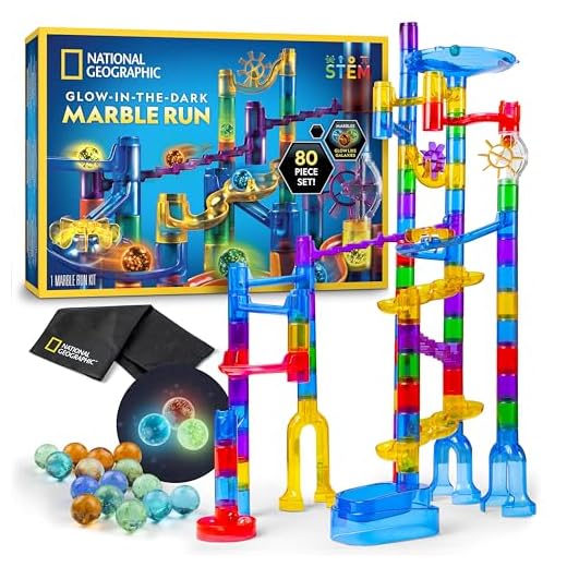 NATIONAL GEOGRAPHIC Glowing Marble Run – 80 Piece Construction Set with 15 Glow in the Dark Glass Marbles, Mesh Storage Bag & Marble Pouch, Great Creative STEM Toy for Girls & Boys