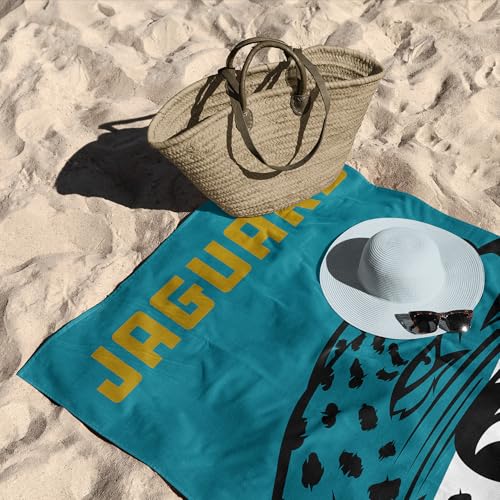 Image of Northwest NFL Jacksonville Jaguars Microfiber Beach Towel, 30 x 60 Inches - Quick Dry, Sand Resistant, Lightweight, Highly Absorbent, Incisor Design