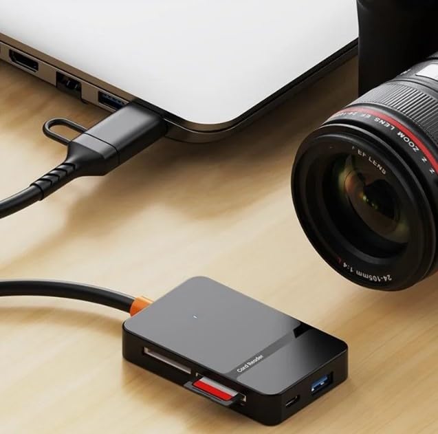 Card reader connected to a laptop, with a camera lens nearby