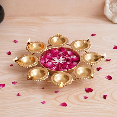 Image of eCraftIndia Golden Metal Handcrafted Decorative Urli with 8 Diyas | Urli Bowl for Home Decor | Urli for Floating Flowers | Diwali Decoration Items for Home Decor | Housewarming Diwali Gift