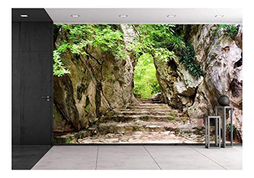 wall26 - Scenic Stone Stairs Leading Up to Gate in Rocks Among Green Foliage - Removable Wall Mural | Self-Adhesive Large Wallpaper - 66x96 inches