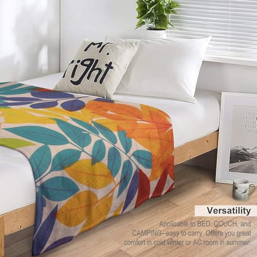 Couverture flanelle feuilles multicolores légère et confortable lit