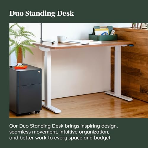 Image of Branch Duo Standing Desk, Adjustable Standing Desk with 20 inch Range | OLED Control Panel, Frameless Design and Compact Size Suitable for Many Spaces, 48 Inches, Woodgrain Base, White Top