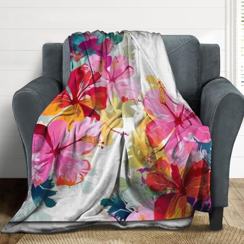 Couverture à imprimé floral hawaïen contre le froid hivernal sur le lit