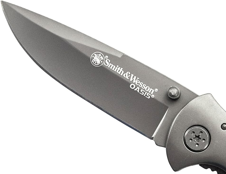 Smith & Wesson Oasis SW423B 7.5in S.S. Folding Knife with a 3.2in Serrated Drop Point Blade and Titanium Coated Handle for Outdoor, Tactical, Survival and EDC