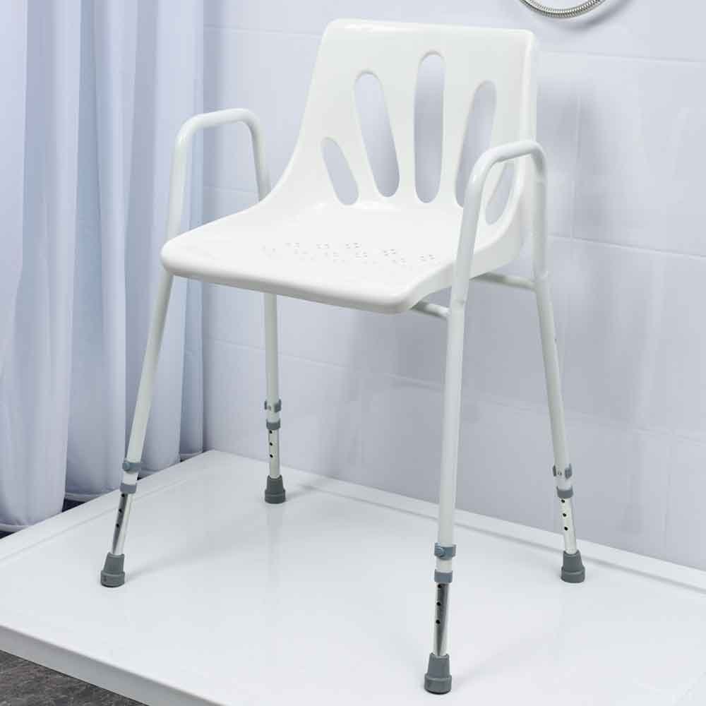 Nrs Healthcare P01560 - Silla de ducha con brazos, altura ajustable