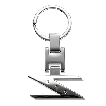 非売品】NISSAN モータースポーツ3点 ビデオ 書籍 キーホルダー