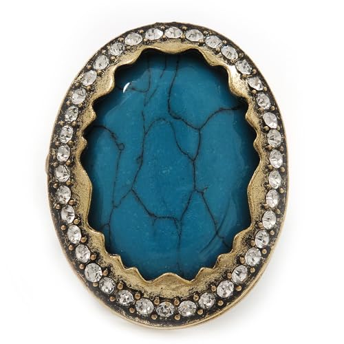 Anillo de cóctel con cristales y piedra ovalada acabado dorado vintage