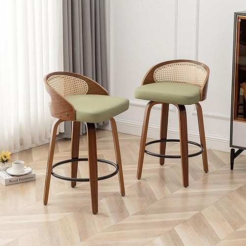 Image of 24.8 inch Swivel Rattan Bar Stools Set of 2,Mid-Century Modern Green Faux Leather Upholstered Counter Height Stools,Kitchen Island Barstools with Rattan Low Backrest,Walnut Wood Finish Bar Chairs