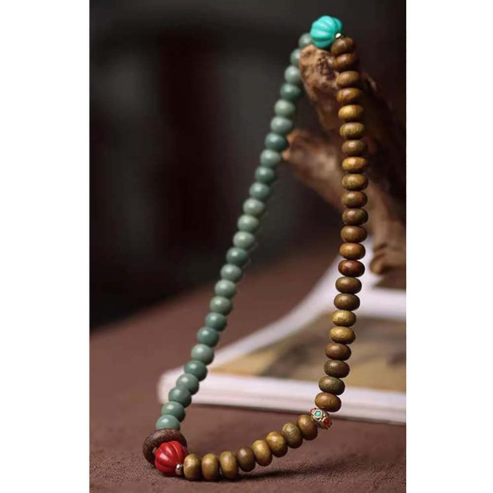 Bellissimo braccialetto Buddha con doppia perla in legno di sandalo