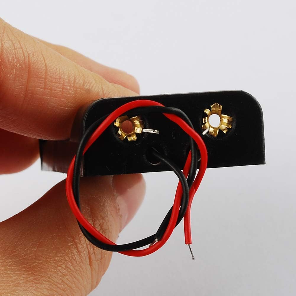 Close-up of the red and black wires connected to the battery holder