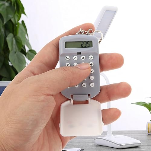 Miniatura 6 de STOBOK 2 piezas mini calculadora llavero de dibujos animados lindo calculadora de dibujos animados calculadora electrónica de bolsillo con llavero