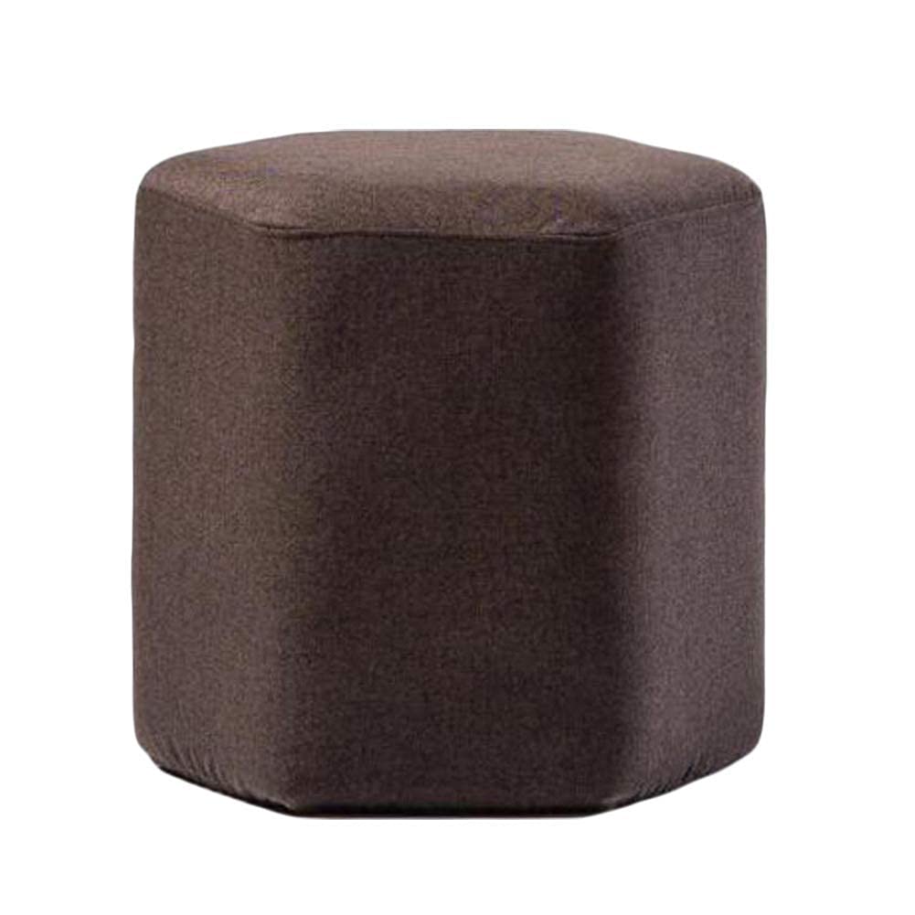 Canapé ottoman brun pour créer un coin lecture cosy dans le salon