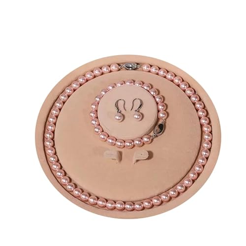 This pink pearl jewelry set includes a delicate bracelet, a