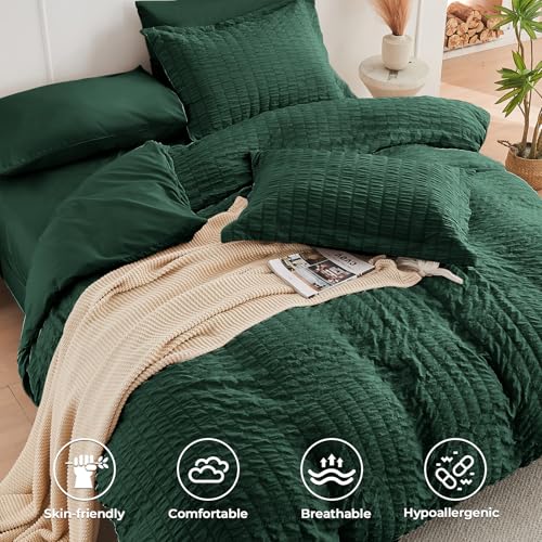 Image of HYMOKEGE Emerald Green Oversized King Comforter Set Seersucker 7 Pieces, All Season Luxury Bed in a Bag for Bedroom, Bedding Set with Comforter, Sheets, Pillowcases & Shams