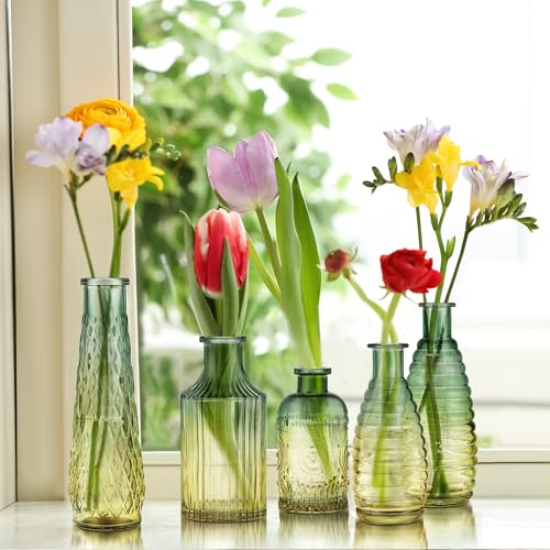Botellas decorativas pequeñas y jarrones de vidrio para flores en eventos 7