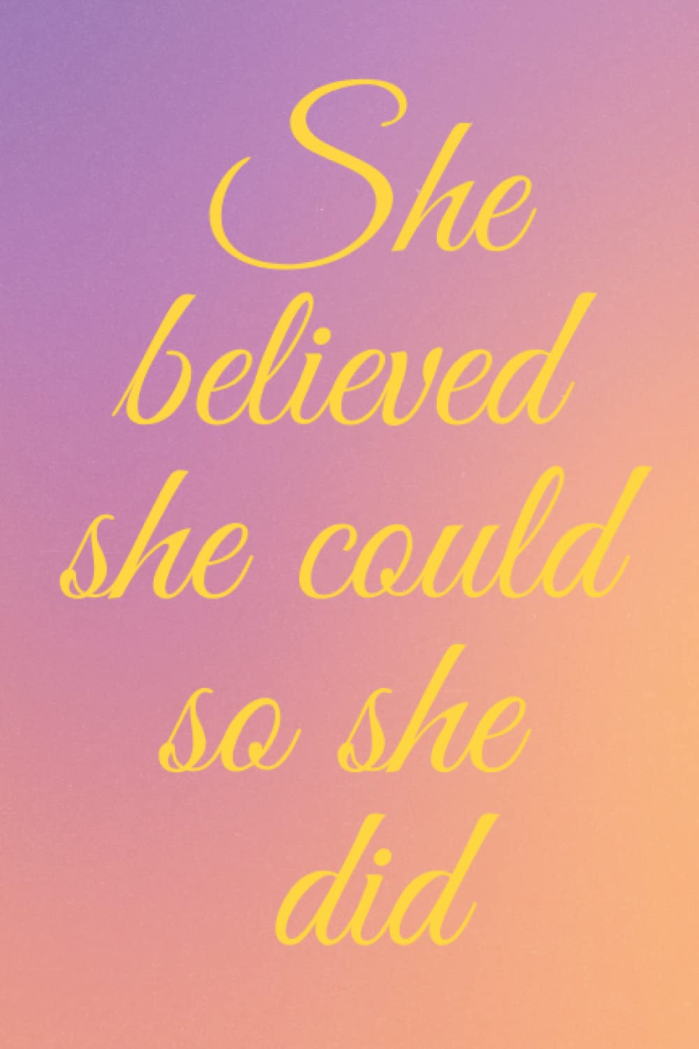 Colorful notebook with a motivational quote on the cover and lined interior