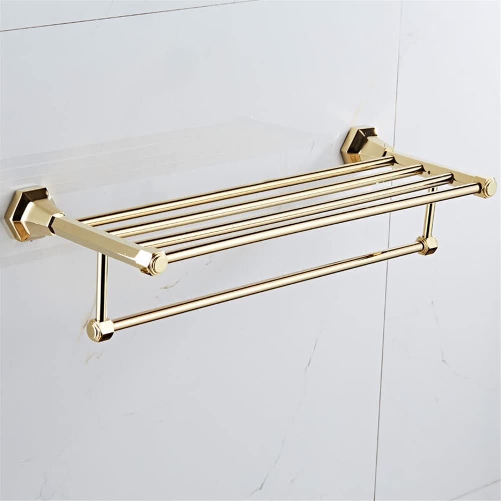 Porte-serviettes doré pour optimiser le rangement des petites salles de bain modernes