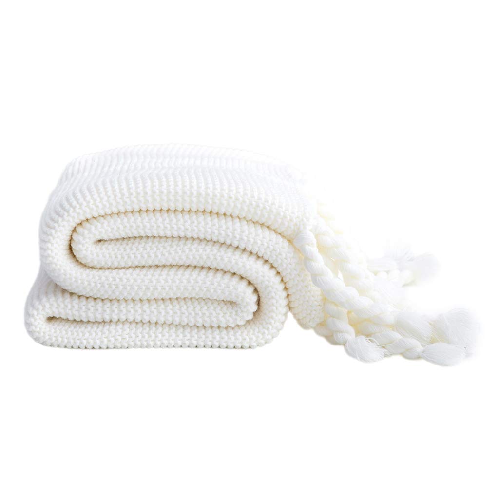Couverture tricotée douce et chaude pour des instants cocooning mémorables