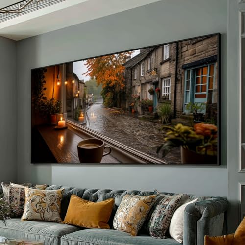 Toile rue de village sous la pluie pour un salon chaleureux en automne