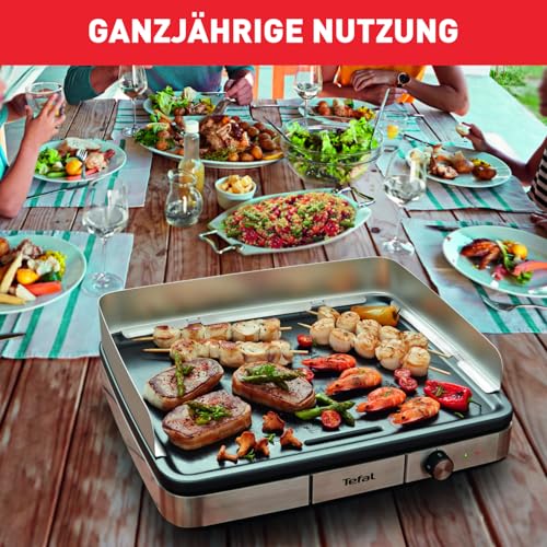 Foto von Tefal Maxi Plancha Elektro-Tischgrill CB690D, Extra groß, Antihaft Teppanyaki Platte, Leichte Reinigung, Innen und außen nutzbar, Inkl. abnehmbarem Windschutz + Spatel, 2300W, Schwarz/Silber