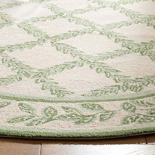 Tapete decorativo ovalado 4'6" x 6'6" de lana miniatura 6