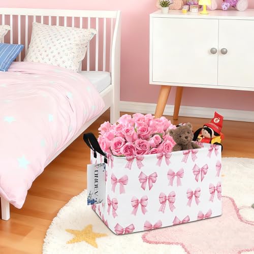 Image of Rectangular Pink Bow Closet Storage Bin, Foldable Clothes Organizer | Moisture-proof premium canvas, reinforced side grips, compact narrow rectangular bin for wardrobe, bedroom, hallway, bathroom