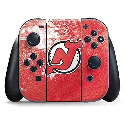 Skinit Decal Gaming Skin Compatible with Nintendo Switch Joy Con Controller - Officially Licensed NHL New Jersey Devils Frozen Design