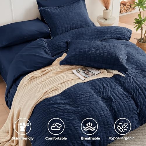 Image of HYMOKEGE Navy Blue California King Comforter Set Seersucker 7 Pieces, All Season Luxury Bed in a Bag for Bedroom, Bedding Set with Comforters, Sheets, Pillowcases & Shams