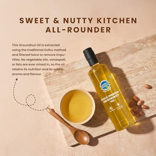 Image of Country Delight Groundnut Oil - 700 ML | Cold Pressed Non-refined Pure Groundnut Oil | Traditional Kohlu Extraction /Kacchi Ghani /Mara Chekku Style | Sweet Aroma & Flavor of Groundnut (Peanut) seeds | Double Filtered