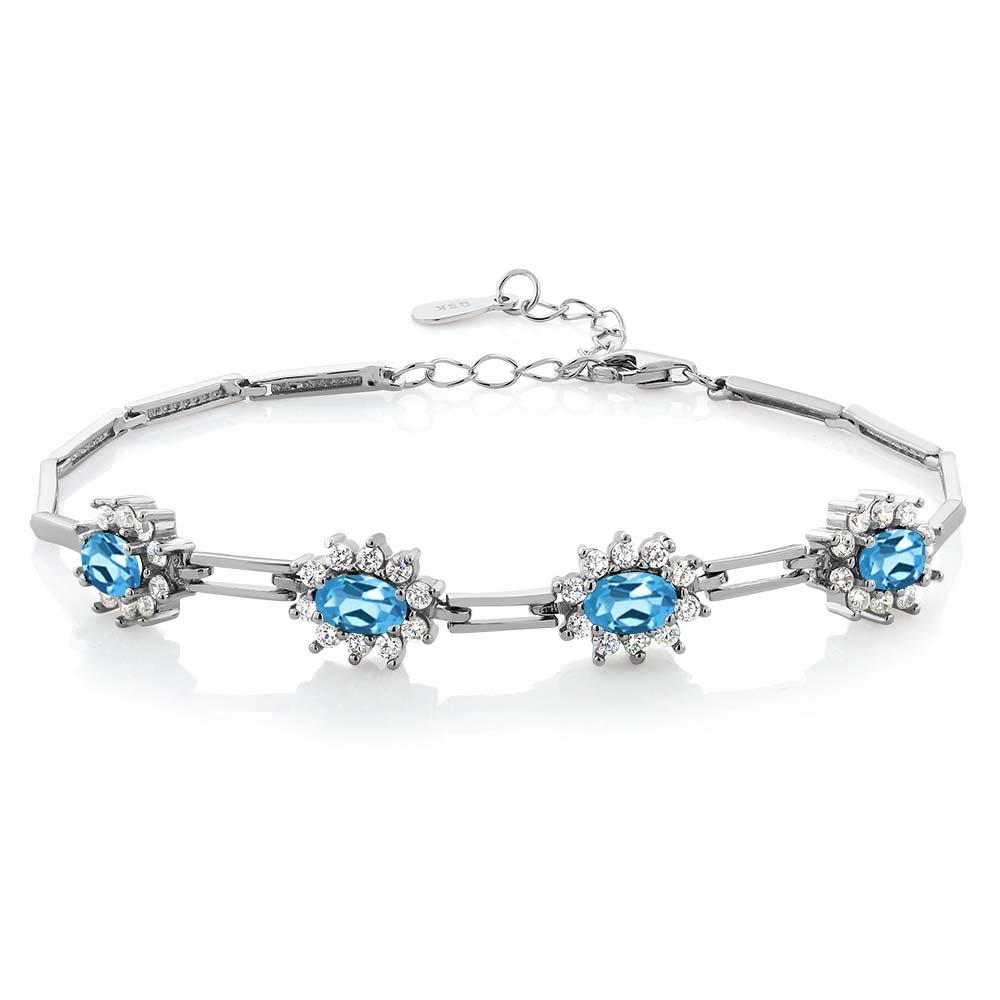 Gem Stone King925 Sterling Silver Swiss Blue Topaz Tennis Bracelet For Women (4.20 Cttw, Gemstone Birthstone, Oval 6X4MM, 7 Inch with 1 Inch Extender)