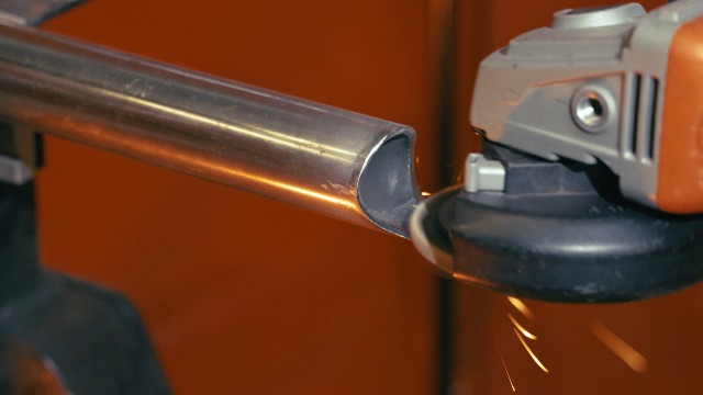 Image of Weiler 50006 Tiger 5 /8 inch-11 Arbor, 4-1 /2 inch Diameter, 40 Grit, Zirconium, Trimmable Composite Backing, Angled Abrasive Flap Disc