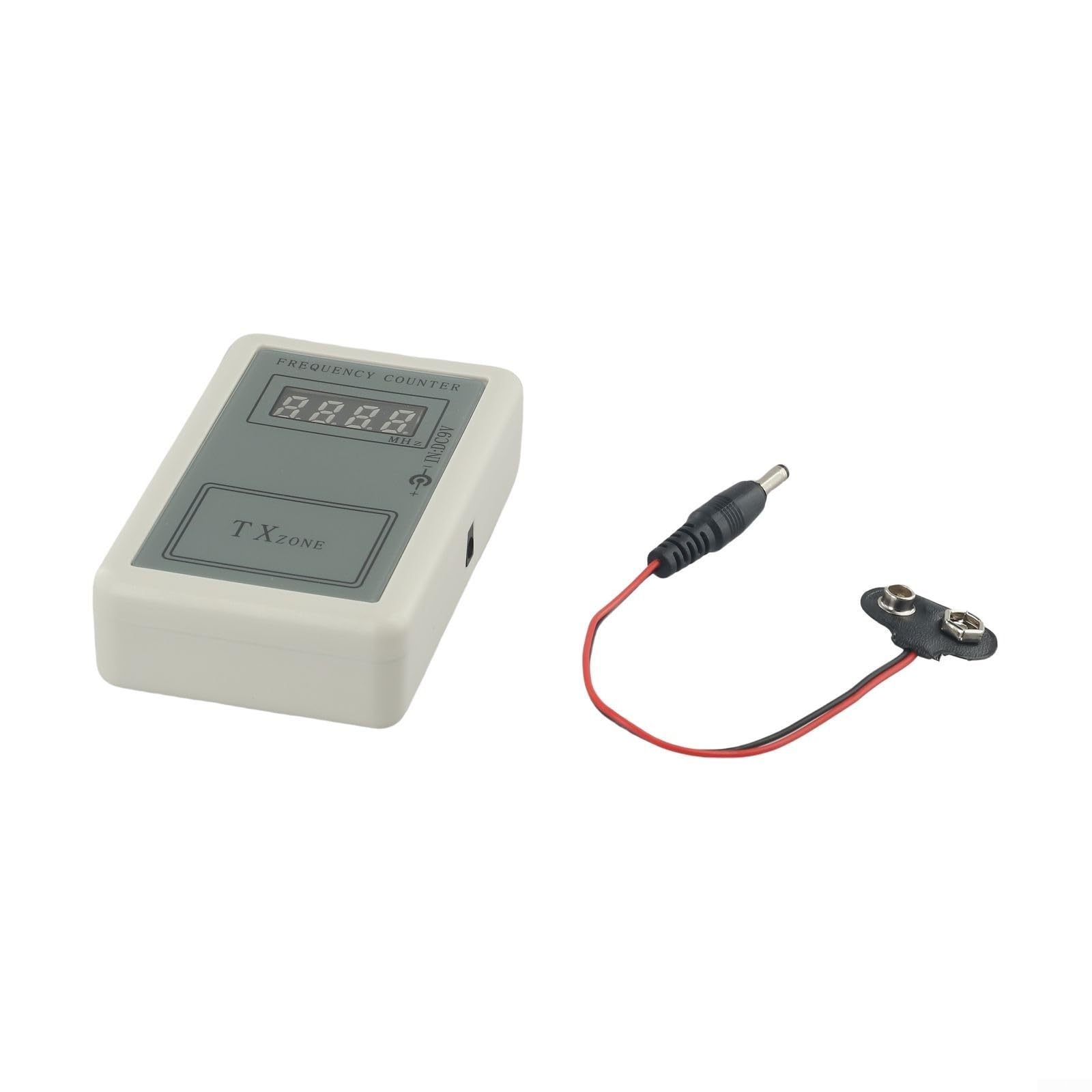 Tester tenuto in mano del contatore di frequenza di rf per i regolatori elettrici della porta ed i antifurto