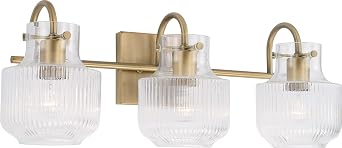 Capital Lighting 145131AD Nyla Transitional Clear Fluted Glass Vanity Lights for Bathroom, 3-Light 300 Total Watts, 9" H x 24" W, Aged Brass