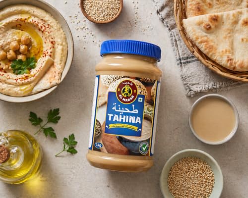 Image of AL MARAH White Tahini /Tahina Paste, 1KG (100% Hummus Ground Hulled Sesame Seed Paste Smooth & Creamy, Natural For Hummus, Middle Eastern Condiment For Salad Dressings, Baba Ghanoush)