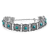 Dieser südwestlichen Stil Collier ist eine wunderbare Mischung aus traditionellem Stil und moderne Trends. Mit versilberten Discs mit floralen Motiven überstreifen simulierten türkis Zentren, dieses ist ein tolles Stück. Bei 11 in lang und 0,8 Zoll hoch, dieses Halsband ist ein tolles Geschenk für Boho chic Freund.