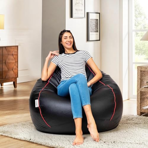 Image of Amazon Brand - Solimo 6XL Premium Faux Leather Bean Bag Filled with Beans for Living Room | Capacity Upto 6'9 inch Height & 135 Kg Weight | Pre-Filled Bean Bags for Office Use (Black with Pink Piping)