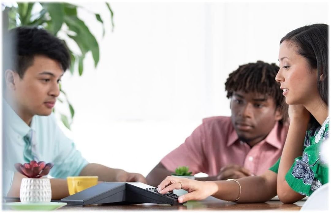People using Polycom Poly Trio 8300 in a meeting