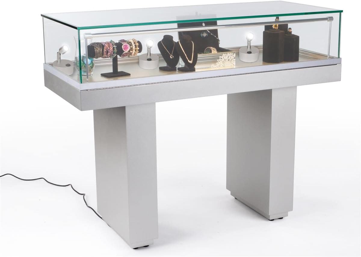 Multiple accent lights illuminating items in a display case