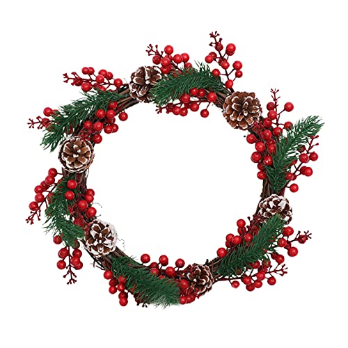 Couronne de Noël en baies rouges pour décorer le porche de maison