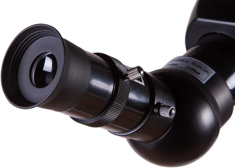 Close-up of an eyepiece inserted into the diagonal mirror of the telescope