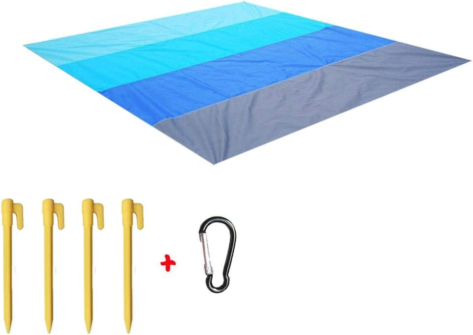 la coperta da spiaggia libera la sabbia